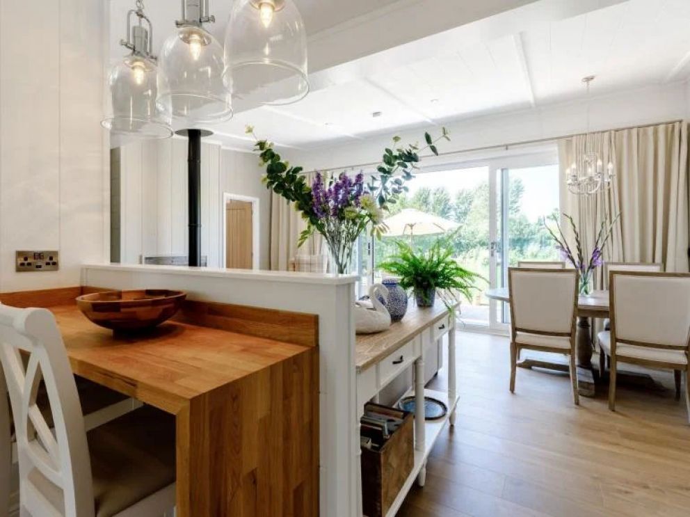 Ludlow Fishing Lodges in Ashford Bowdler for rent with wood burner and views across the fishing pool