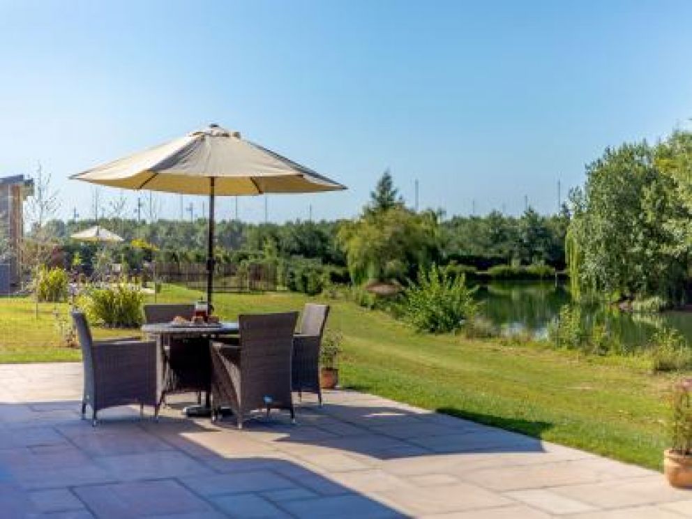 Ludlow Fishing Lodges in Ashford Bowdler for rent with wood burner and views across the fishing pool