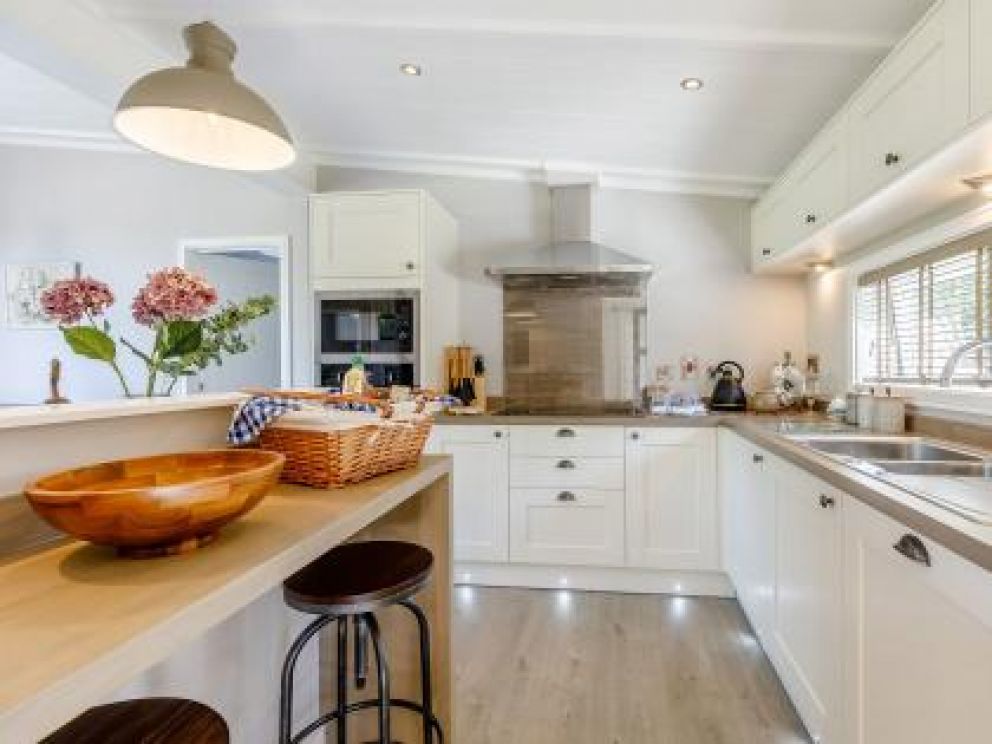 Ludlow Fishing Lodges in Ashford Bowdler for rent with wood burner and views across the fishing pool