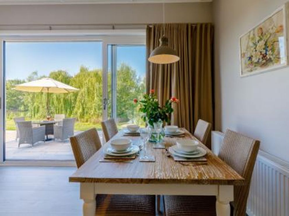 Ludlow Fishing Lodges in Ashford Bowdler for rent with wood burner and views across the fishing pool