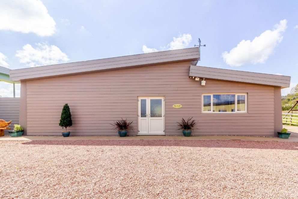 The Croft, Leigh Sinton, Worcestershire - pet friendly, holiday lodge with hot tub, wood burning stove and bike store