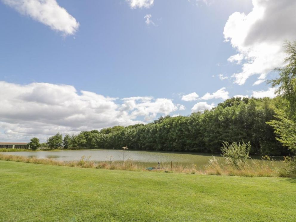 The Croft, Leigh Sinton, Worcestershire - pet friendly, holiday lodge with hot tub, wood burning stove and bike store