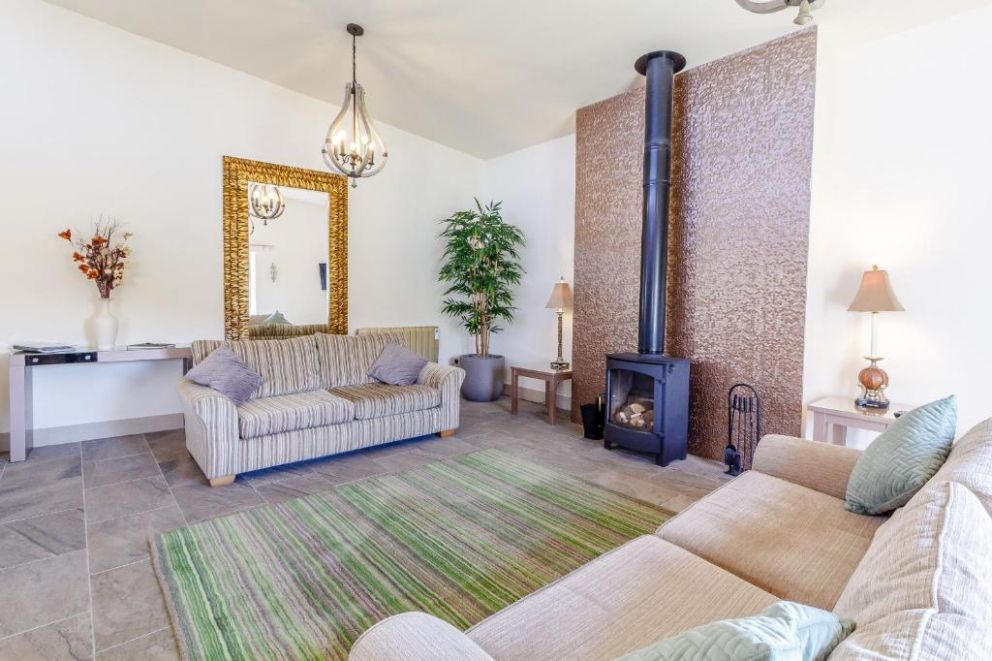 The Croft, Leigh Sinton, Worcestershire - pet friendly, holiday lodge with hot tub, wood burning stove and bike store