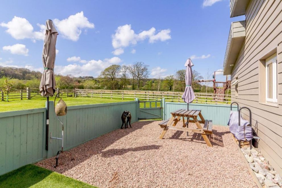 The Croft, Leigh Sinton, Worcestershire - pet friendly, holiday lodge with hot tub, wood burning stove and bike store