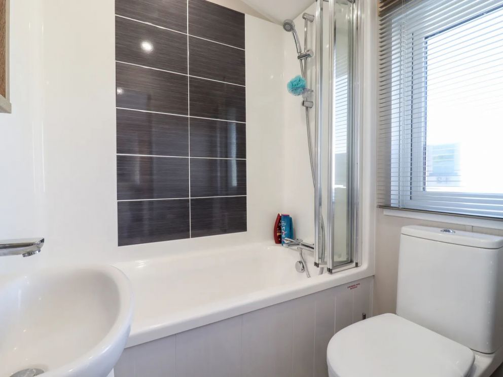 12 Meadow View, Carlton, Saxmundham, Suffolk - pet friendly, holiday lodge on Carlton Meres Holiday Park with indoor & outdoor swimming pools, adventure playground, restaurant, bar and clubhouse, close to the beach