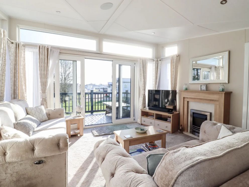 12 Meadow View, Carlton, Saxmundham, Suffolk - pet friendly, holiday lodge on Carlton Meres Holiday Park with indoor & outdoor swimming pools, adventure playground, restaurant, bar and clubhouse, close to the beach