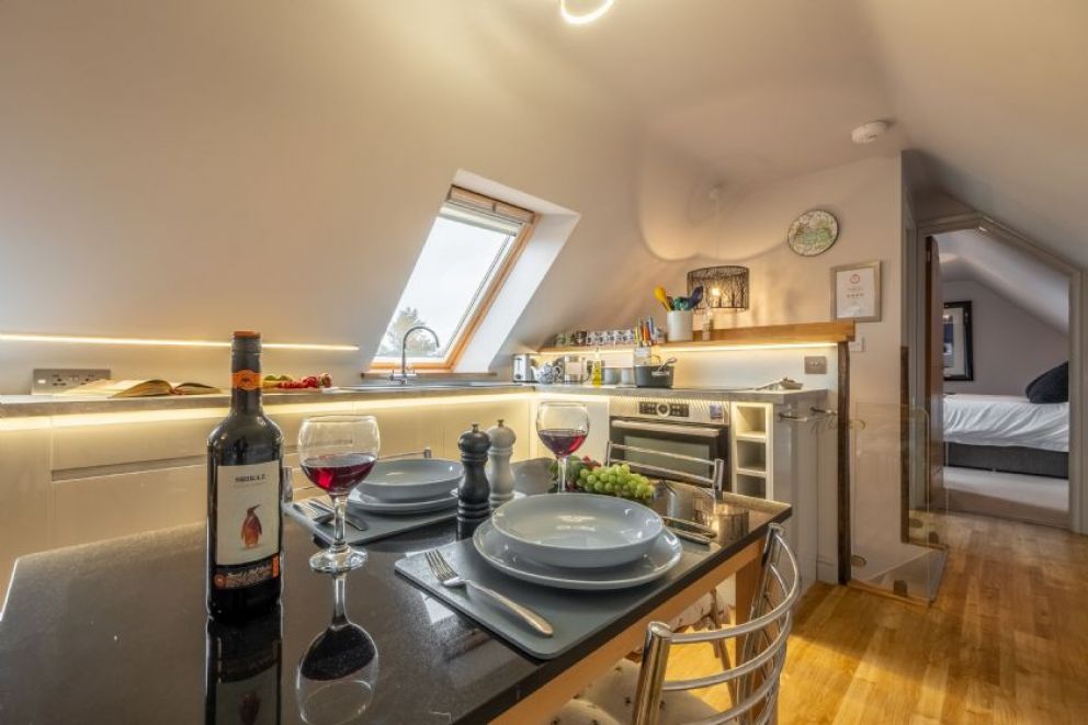 Cartshed Lodge, Hoveton in the heartland of the Norfolk Broads - adult only lodge for rent with hot tub, sun loungers and barbecue