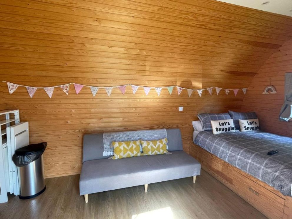 Wildflower Meadow Cabins, Fendicks Fisheries, Norfolk - pet friendly holiday cabins sleeping up to 6 adults. Choice of accommodation some with a wood burning hot tub
