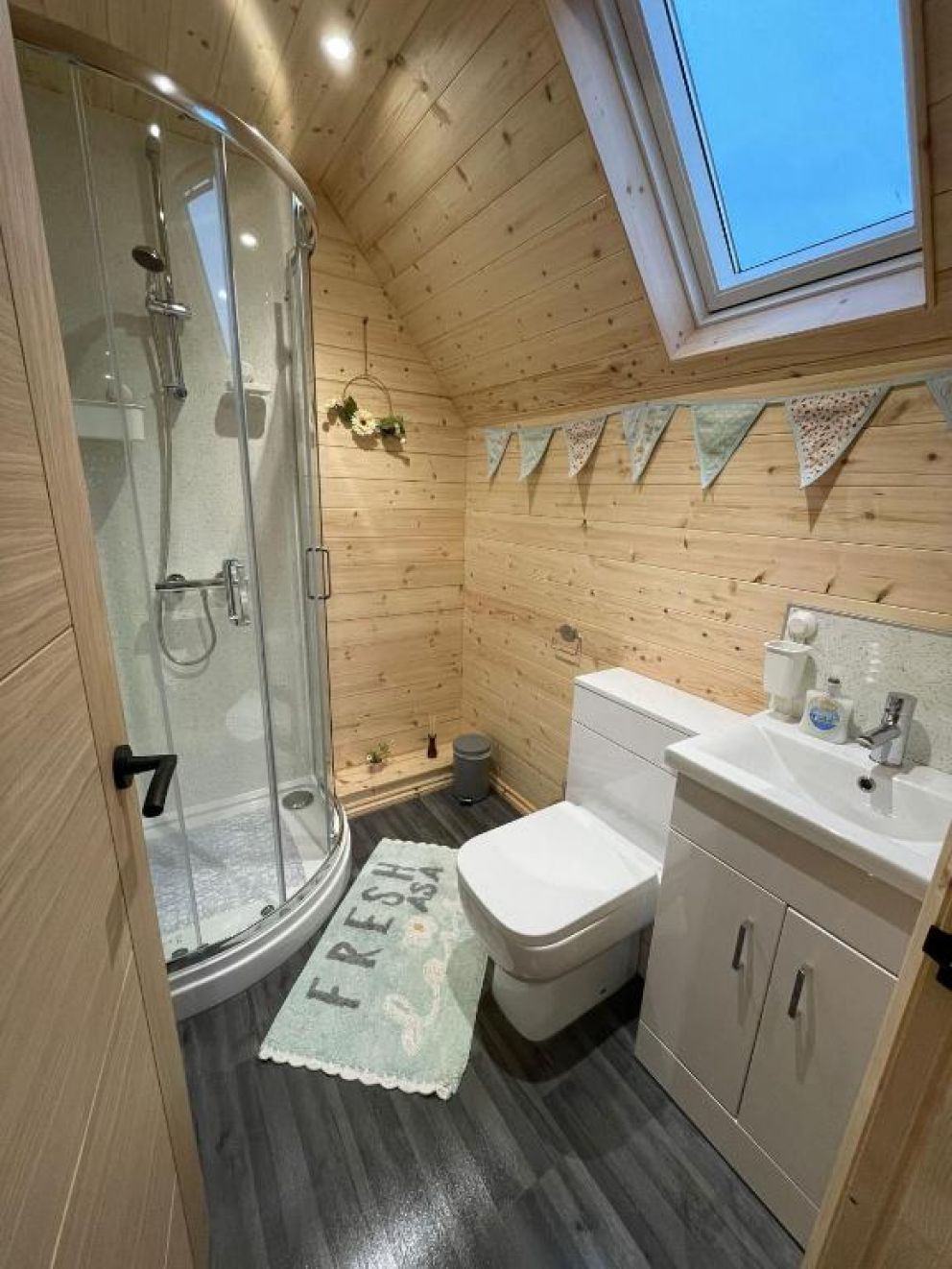 Wildflower Meadow Cabins, Fendicks Fisheries, Norfolk - pet friendly holiday cabins sleeping up to 6 adults. Choice of accommodation some with a wood burning hot tub