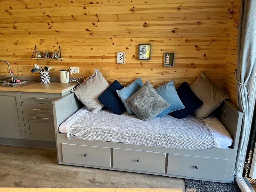 Wildflower Meadow Cabins, Fendicks Fisheries, Norfolk - pet friendly holiday cabins sleeping up to 6 adults. Choice of accommodation some with a wood burning hot tub