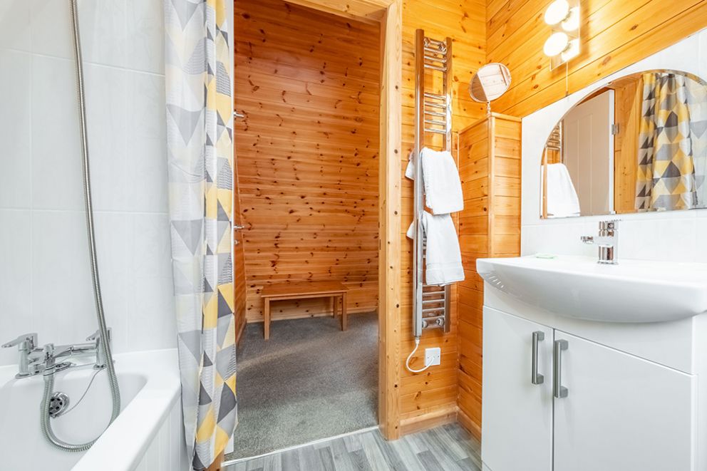 Woodpecker, Holt, Norfolk - pet friendly lodge for rent, close to beach