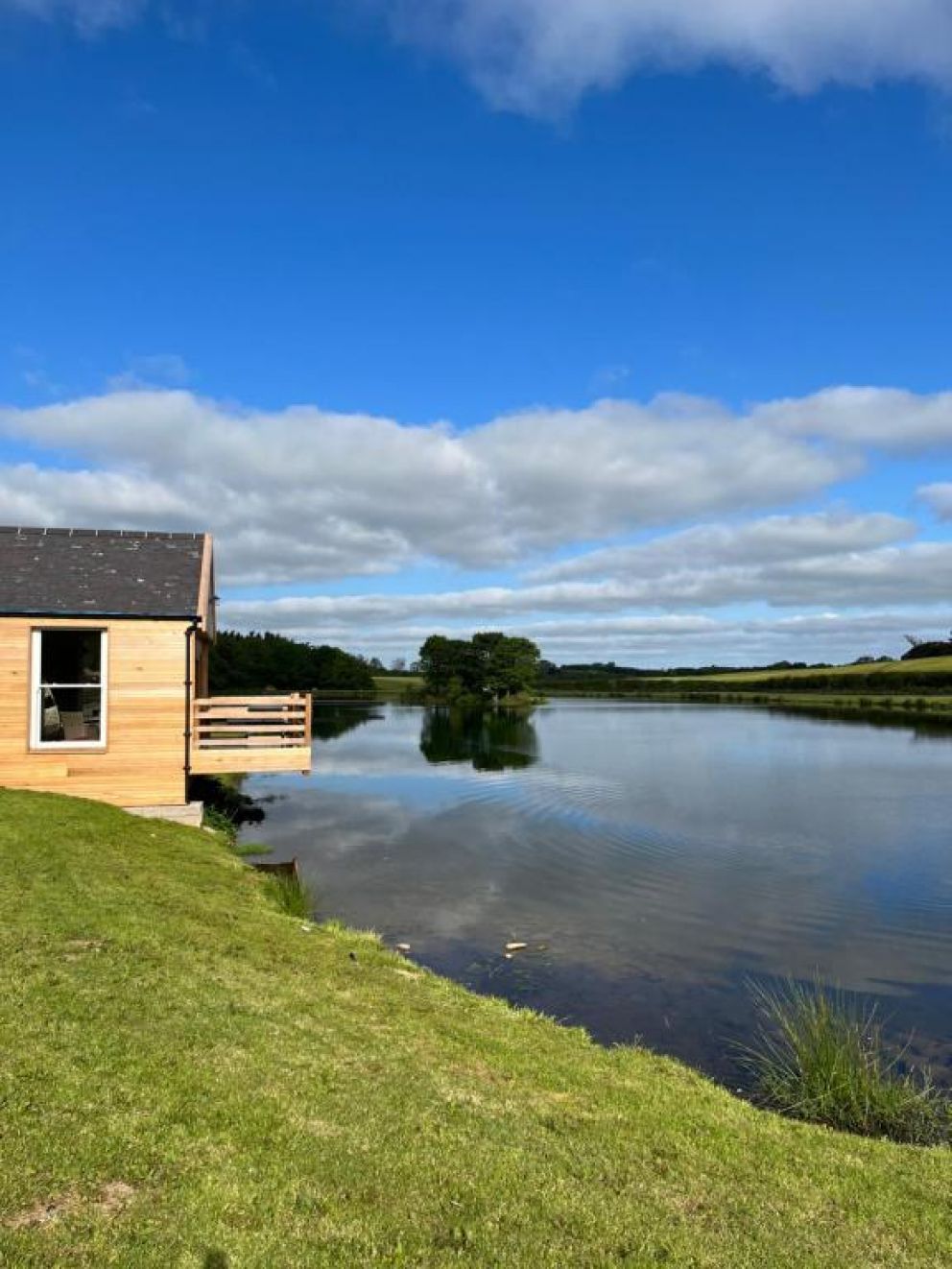 East Learmouth Lakeside Lodges - Larch Lodge in Cornhill-on-Tweed, Northumberland - pet friendly, holiday lodge by river with hot tub