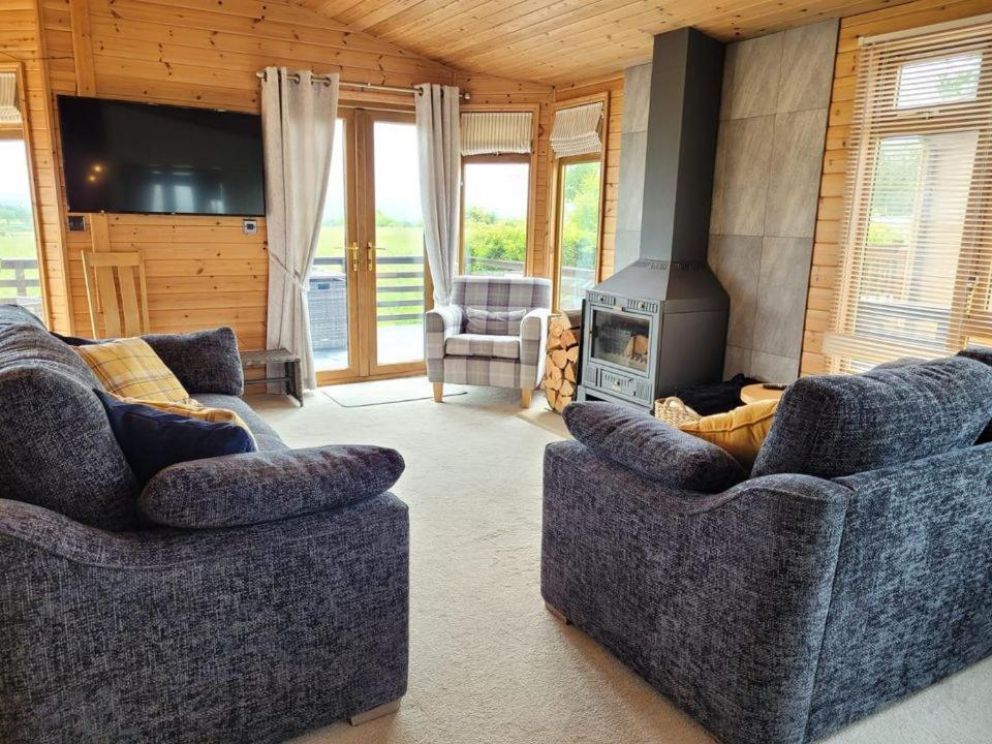 Fell Side Lodge at Bowland Fell Holiday Park in Skpton, North Yorkshire - 3 bedroom holiday lodge with WiFi and wood burning stove.  Park facilities - indoor swimming pool, bar and restaurant