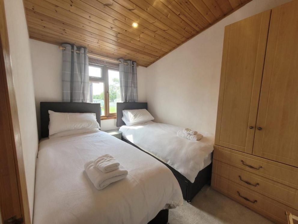 Fell Side Lodge at Bowland Fell Holiday Park in Skpton, North Yorkshire - 3 bedroom holiday lodge with WiFi and wood burning stove.  Park facilities - indoor swimming pool, bar and restaurant