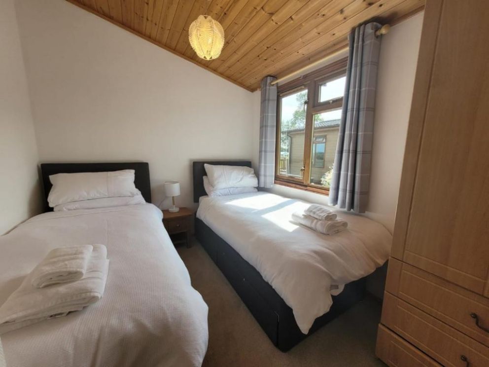 Fell Side Lodge at Bowland Fell Holiday Park in Skpton, North Yorkshire - 3 bedroom holiday lodge with WiFi and wood burning stove.  Park facilities - indoor swimming pool, bar and restaurant