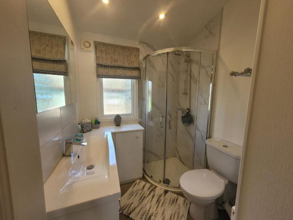 Fell Side Lodge at Bowland Fell Holiday Park in Skpton, North Yorkshire - 3 bedroom holiday lodge with WiFi and wood burning stove.  Park facilities - indoor swimming pool, bar and restaurant