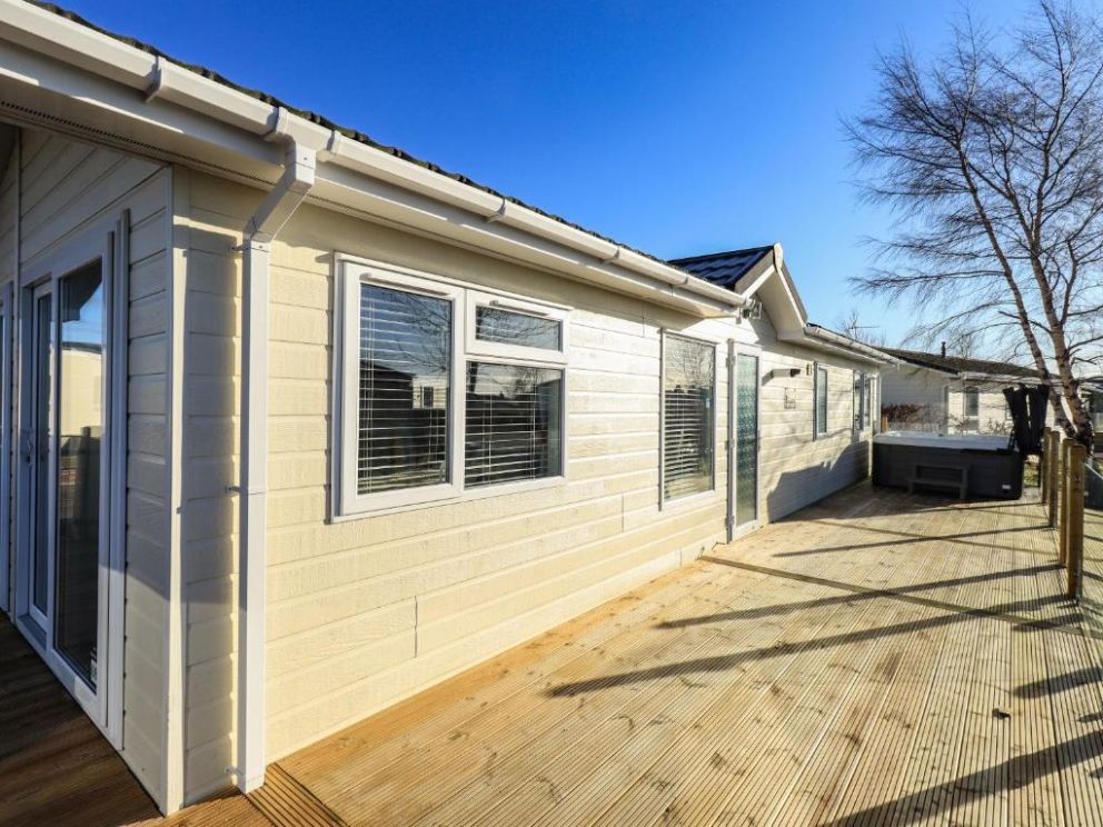 Finchwood Lodge in High Hesket, Cumbria - for rent with hot tub and enclosed decking