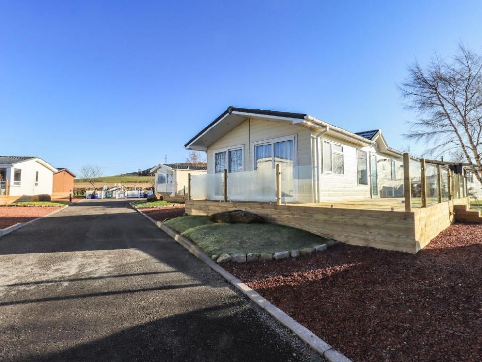 Finchwood Lodge in High Hesket, Cumbria - for rent with hot tub and enclosed decking