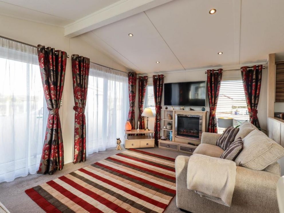 Finchwood Lodge in High Hesket, Cumbria - for rent with hot tub and enclosed decking