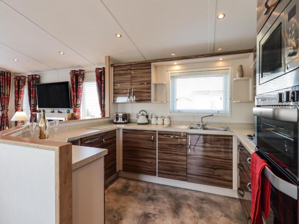 Finchwood Lodge in High Hesket, Cumbria - for rent with hot tub and enclosed decking