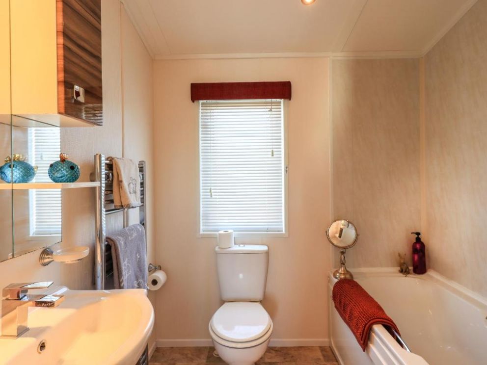 Finchwood Lodge in High Hesket, Cumbria - for rent with hot tub and enclosed decking