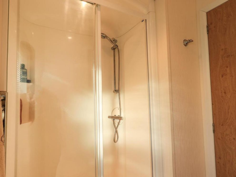 Finchwood Lodge in High Hesket, Cumbria - for rent with hot tub and enclosed decking