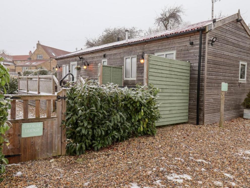 Grouse Lodge, Scarborough, North Yorkshire - dog friendly lodge to rent with hot tub and wood burning stove