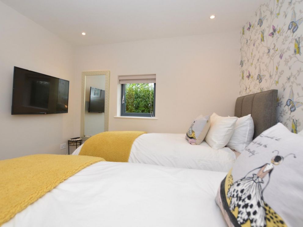 Riverside Fishing Lodge in Balderstone for rent with hot tub, fire pit and wood burner