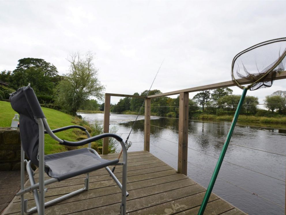 Riverside Fishing Lodge in Balderstone for rent with hot tub, fire pit and woodburner