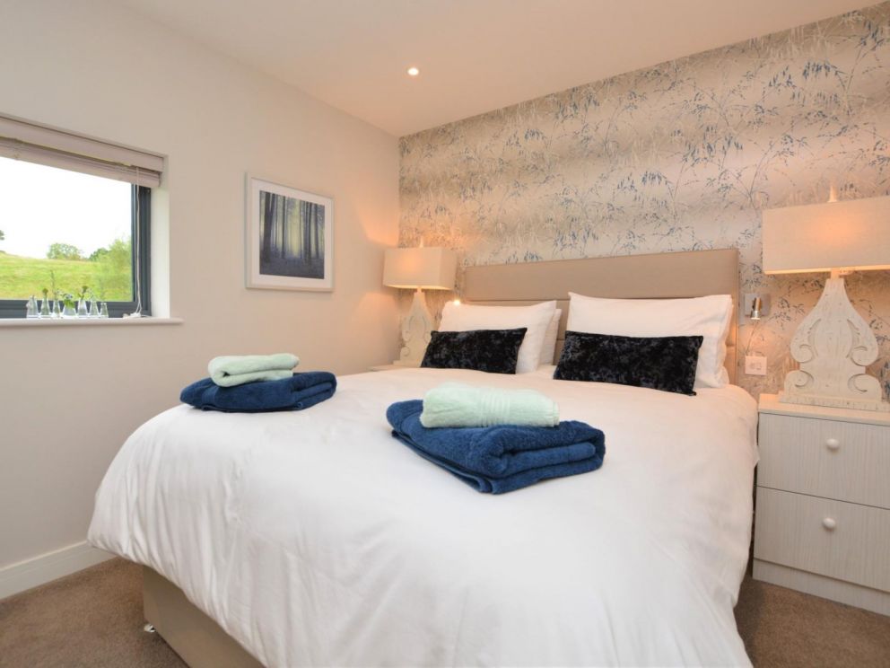 Riverside Fishing Lodge in Balderstone for rent with hot tub, fire pit and woodburner