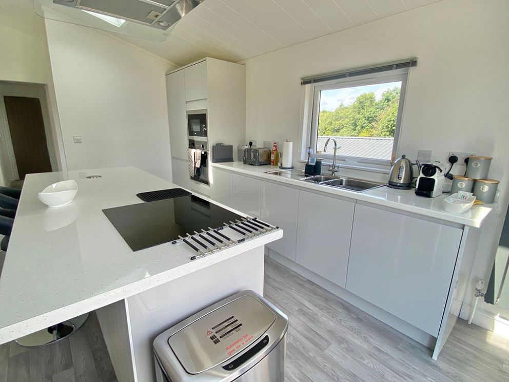 The Lake House kitchen breakfast bar at Docker Holiday Park 