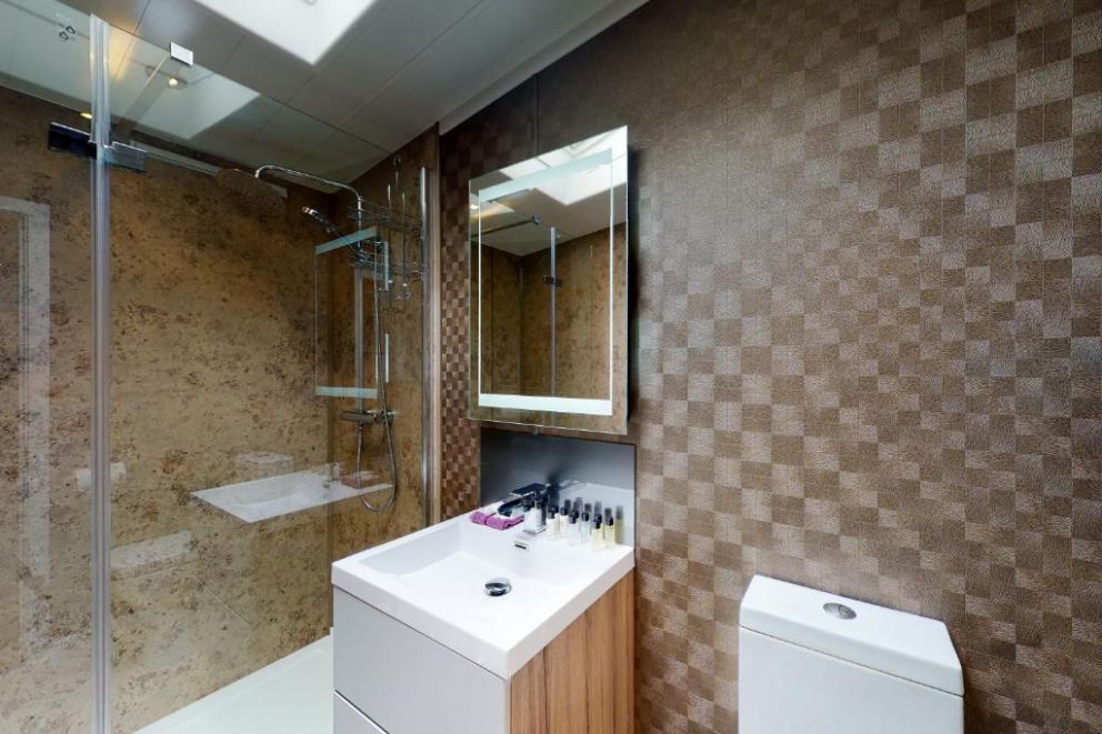 Whistler Lodge at Tattershall Lakes, Lincolnshire - pet friendly holiday lodge, with hot tub, gas barbecue, patio heaters, outdoor music system. Park facilities - bar, restaurant, swimming pool, fishing lakes, water sports, spa