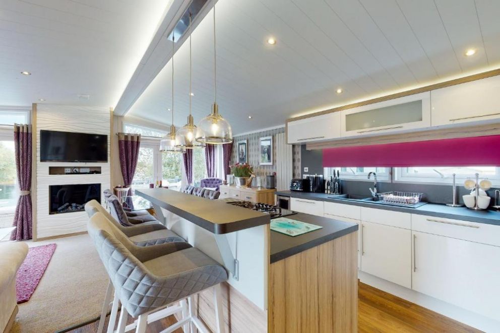 Whistler Lodge at Tattershall Lakes, Lincolnshire - pet friendly holiday lodge, with hot tub, gas barbecue, patio heaters, outdoor music system. Park facilities - bar, restaurant, swimming pool, fishing lakes, water sports, spa
