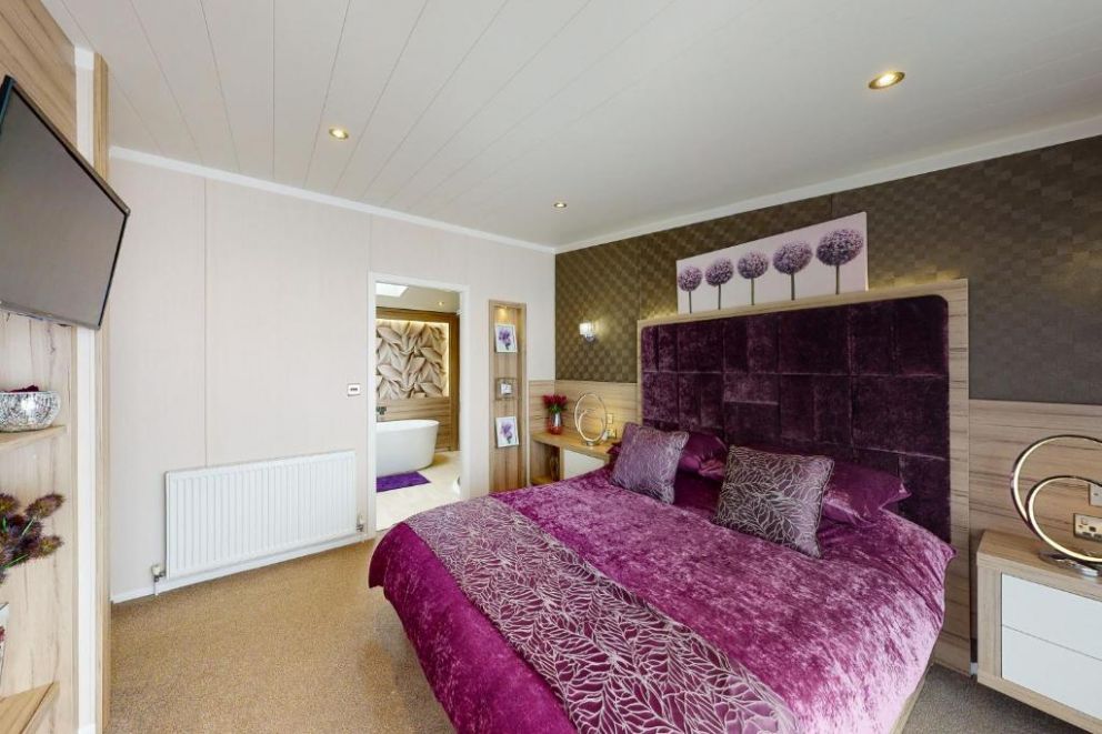 Whistler Lodge at Tattershall Lakes, Lincolnshire - pet friendly holiday lodge, with hot tub, gas barbecue, patio heaters, outdoor music system. Park facilities - bar, restaurant, swimming pool, fishing lakes, water sports, spa