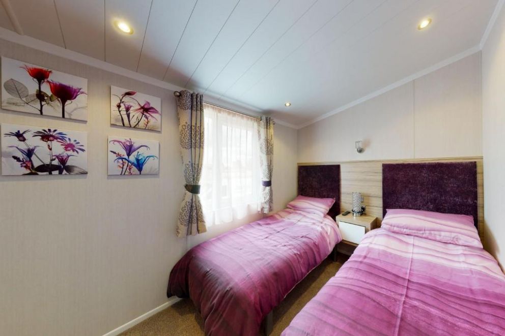 Whistler Lodge at Tattershall Lakes, Lincolnshire - pet friendly holiday lodge, with hot tub, gas barbecue, patio heaters, outdoor music system. Park facilities - bar, restaurant, swimming pool, fishing lakes, water sports, spa