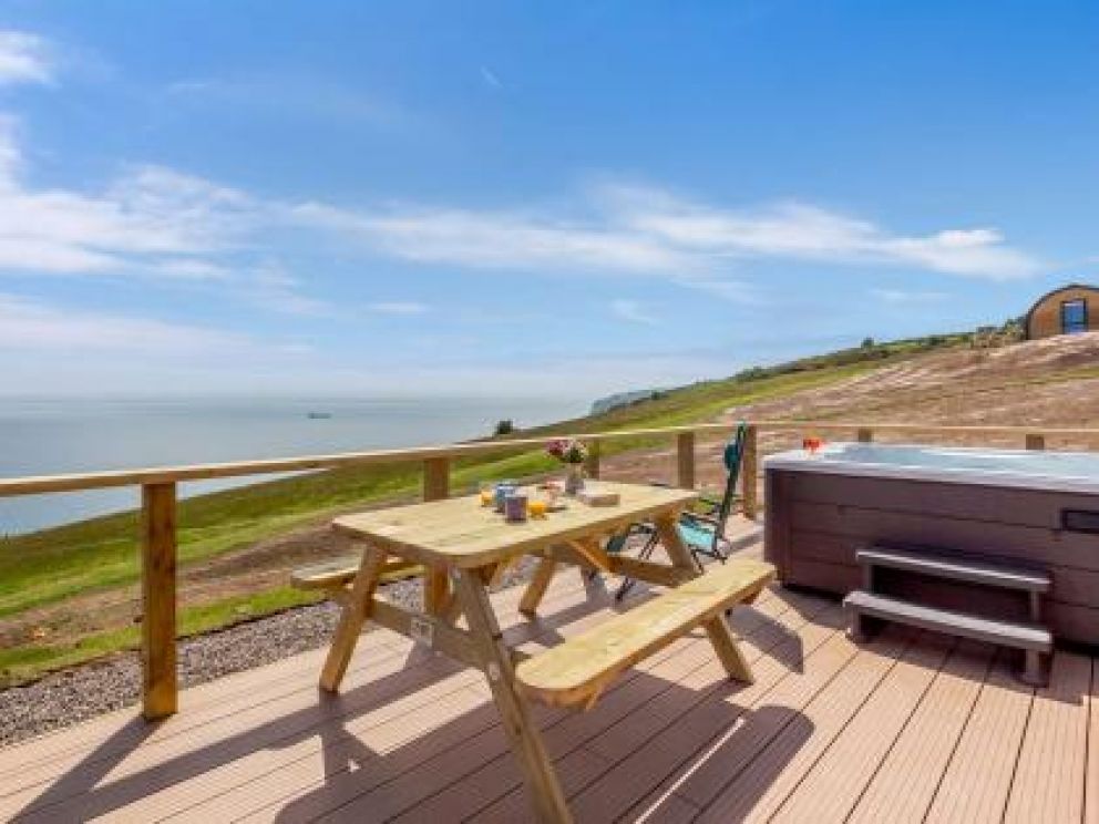 Castlecraig Seaview Cabins in Nigg - pet friendly for rent with hot tub and woodburner