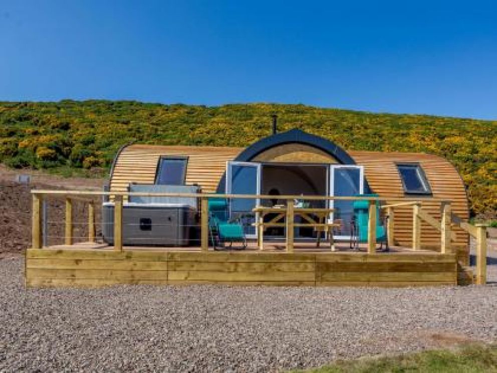 Castlecraig Seaview Cabins in Nigg - pet friendly for rent with hot tub and woodburner