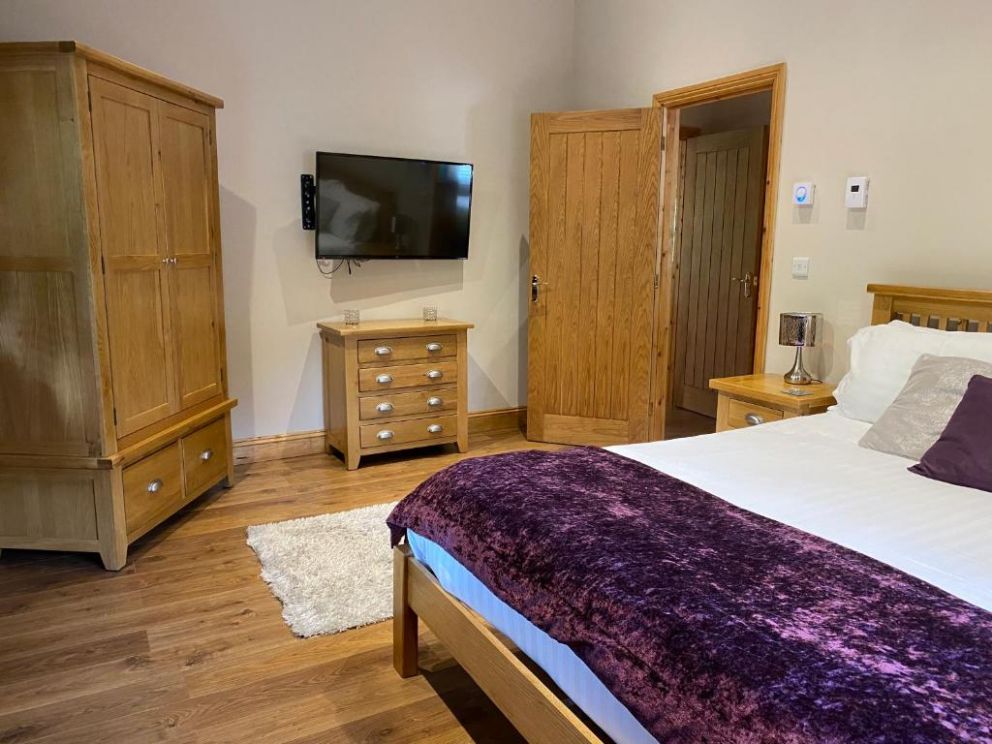 Ewes Water Log Cabins, Langholm, Dumfries & Galloway - wheelchair accessible, pet friendly with wood burner and barbeque in Scotland