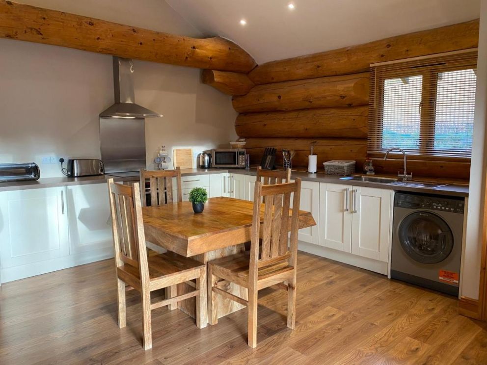 Ewes Water Log Cabins, Langholm, Dumfries & Galloway - wheelchair accessible, pet friendly with wood burner and barbeque in Scotland