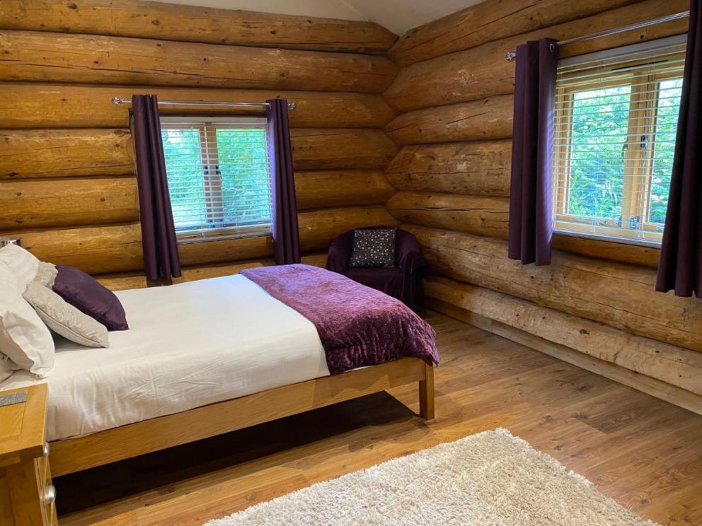 Ewes Water Log Cabins, Langholm, Dumfries & Galloway - wheelchair accessible, pet friendly with wood burner and barbeque in Scotland