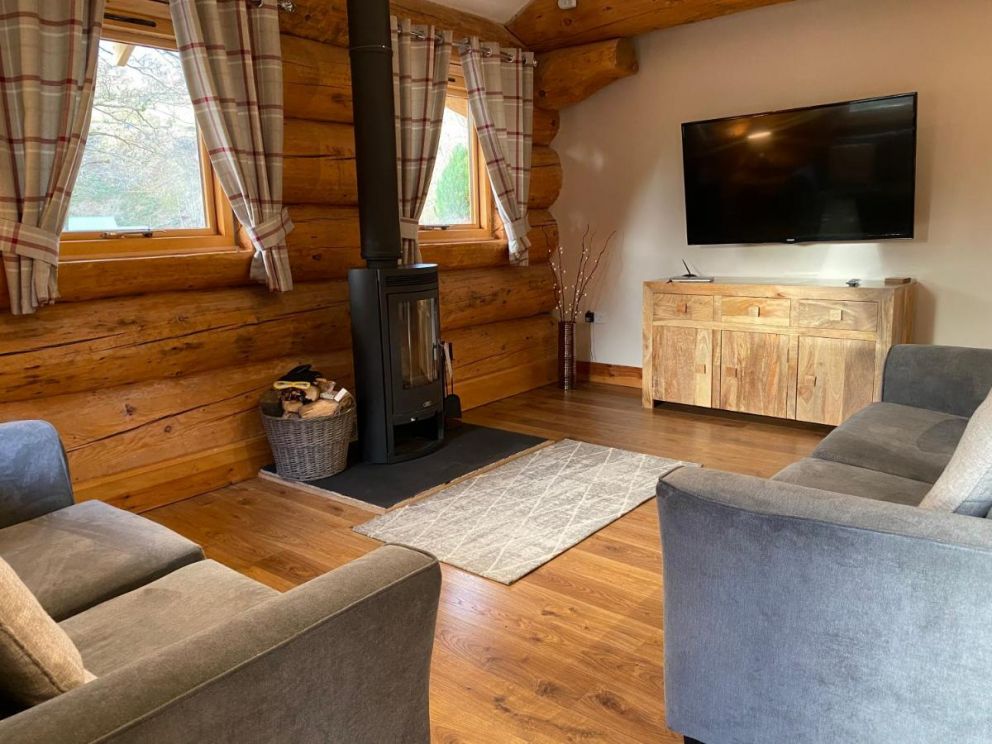 Ewes Water Log Cabins, Langholm, Dumfries & Galloway - wheelchair accessible, pet friendly with wood burner and barbeque in Scotland