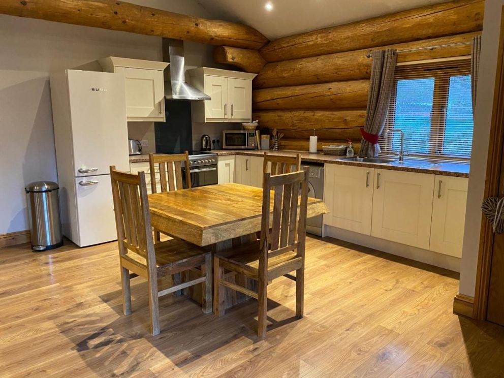 Ewes Water Log Cabins, Langholm, Dumfries & Galloway - wheelchair accessible, pet friendly with wood burner and barbeque in Scotland