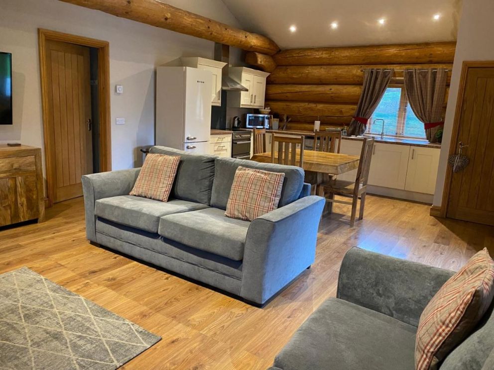 Ewes Water Log Cabins, Langholm, Dumfries & Galloway - wheelchair accessible, pet friendly with wood burner and barbeque in Scotland