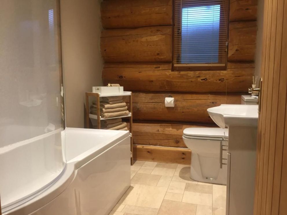 Ewes Water Log Cabins, Langholm, Dumfries & Galloway - wheelchair accessible, pet friendly with wood burner and barbeque in Scotland