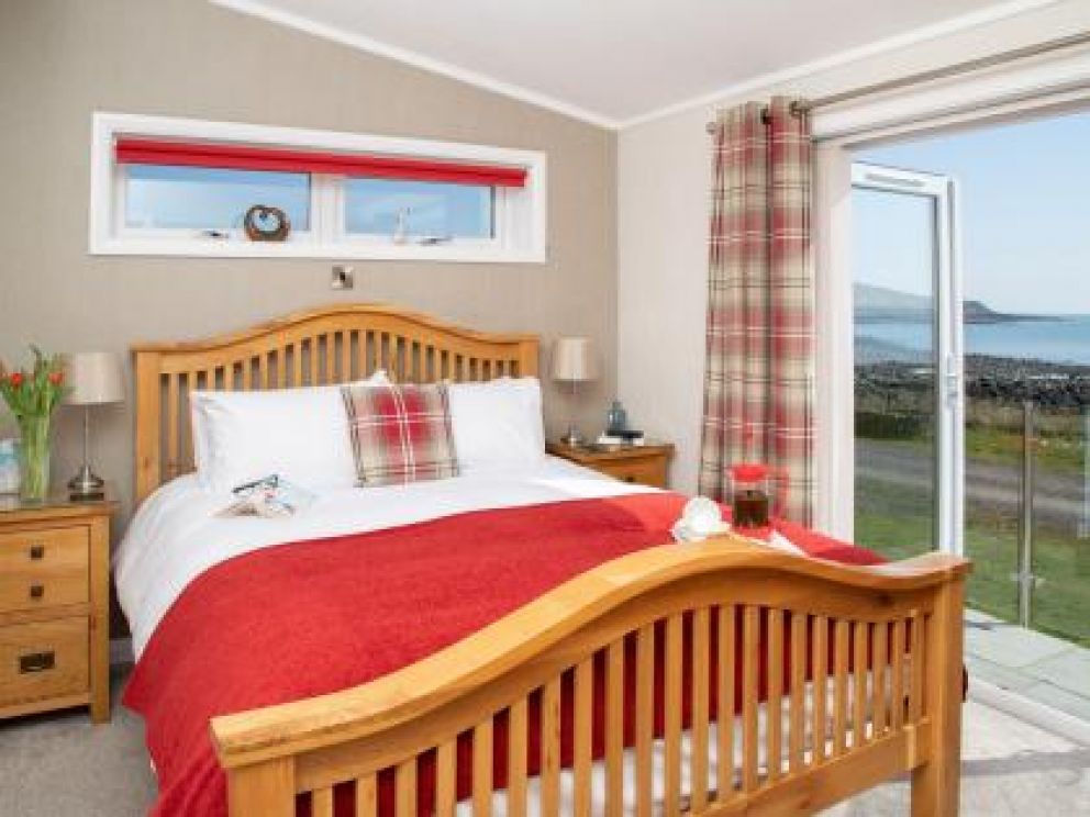 Romantic Hot Tub Lodges at Rascarrel Bay - pet friendly lodges for rent, with hot tub on the sea shore