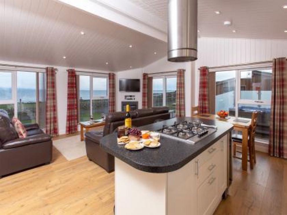 Romantic Hot Tub Lodges at Rascarrel Bay - pet friendly lodges for rent, with hot tub on the sea shore