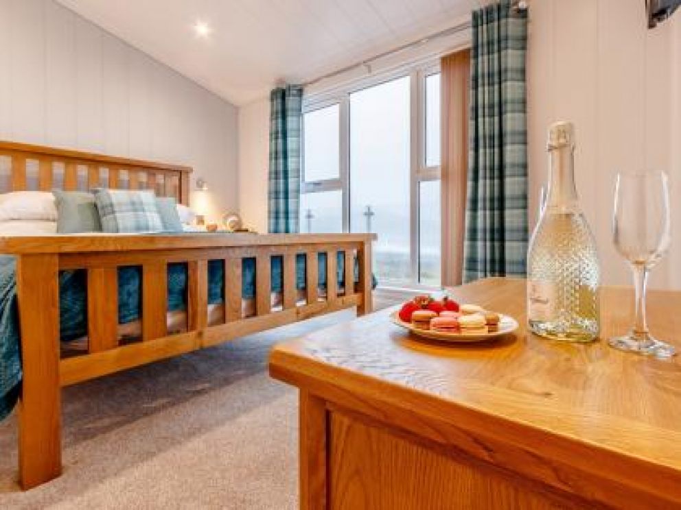 Romantic Hot Tub Lodges at Rascarrel Bay - pet friendly lodges for rent, with hot tub on the sea shore