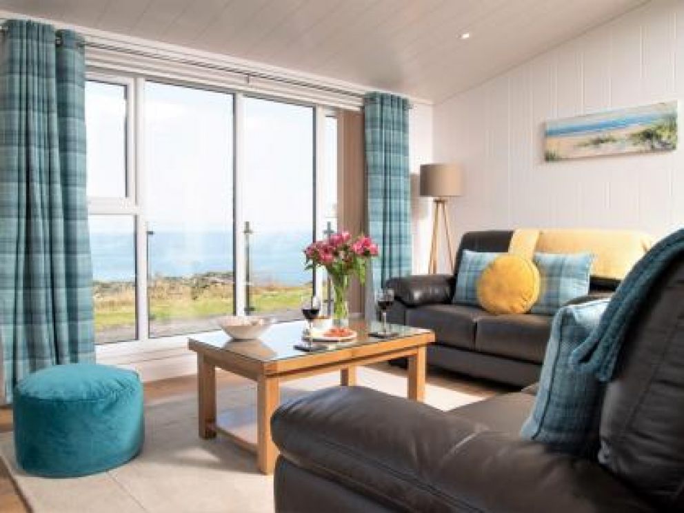 Romantic Hot Tub Lodges at Rascarrel Bay - pet friendly lodges for rent, with hot tub on the sea shore