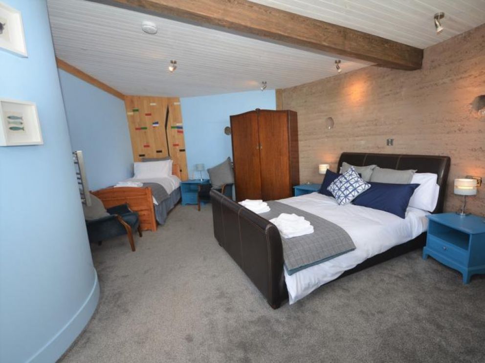 The Loch Leven Earth Ship, Perth and Kinross - pet friendly, quirky holiday lodge, in Scotland with hot tub and wood burning stove on a working farm