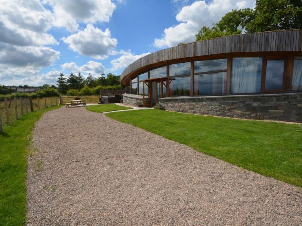 The Loch Leven Earth Ship, Perth and Kinross - pet friendly, quirky holiday lodge, in Scotland with hot tub and wood burning stove on a working farm